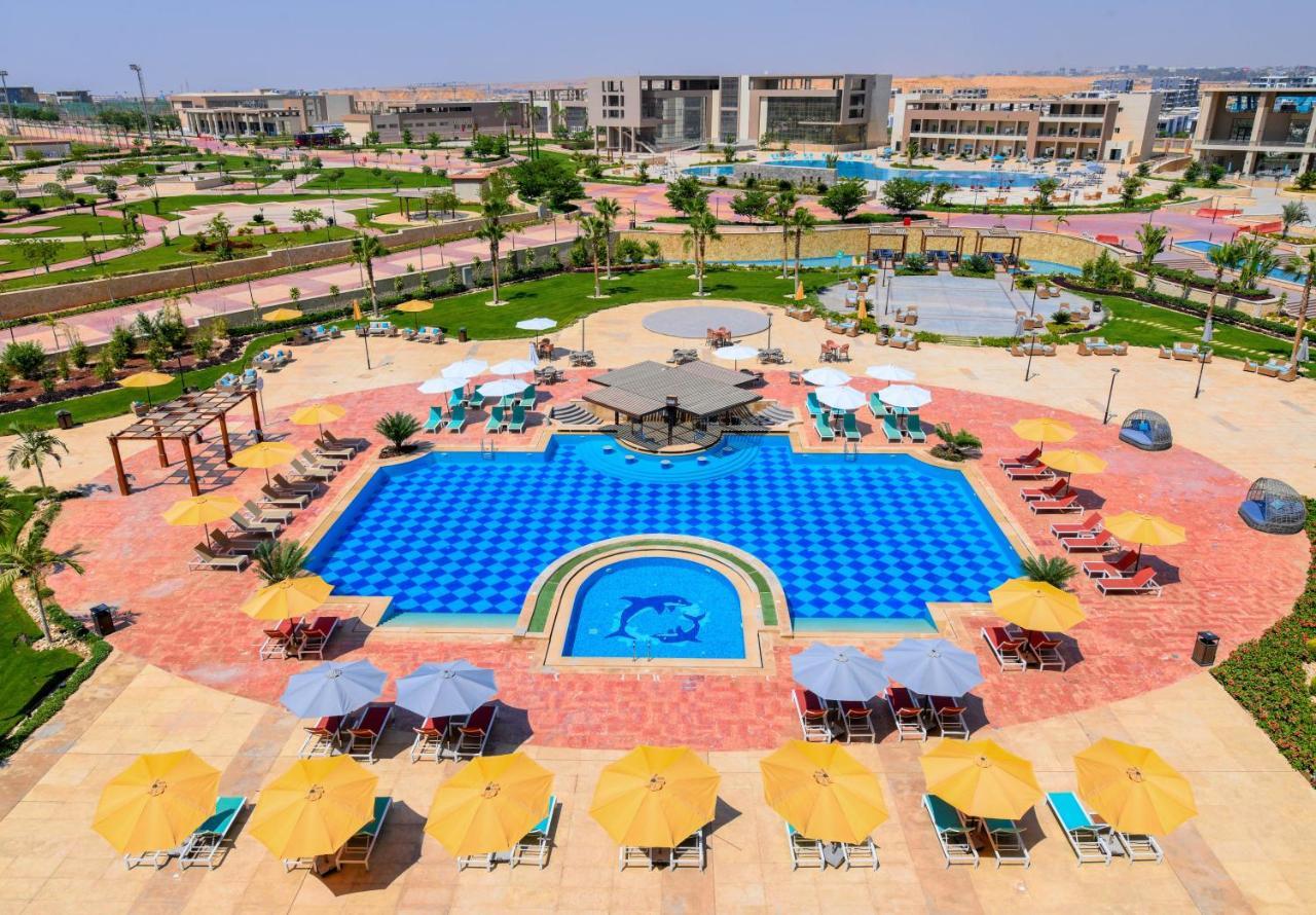 Tolip Gardens Hotel Kairo Exterior foto The swimming pool at the resort